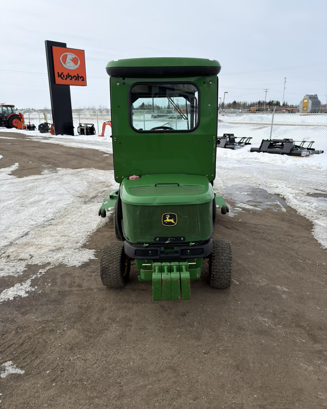 2012 John Deere 1445 Front mount mower & sweeper
